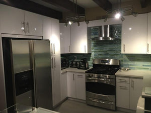 Image Title Nice, shiny, comfortable  and modern kitchen design by our company. We can design, fabricate and install your dreams kitchen.