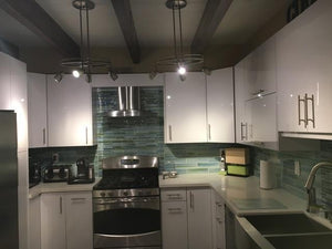 Nice, shiny, comfortable  and modern kitchen design by our company. We can design, fabricate and install your dreams kitchen.