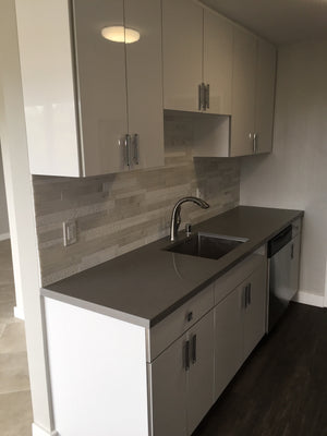 Image Title Nice, shiny, comfortable  and modern kitchen design by our company. We can design, fabricate and install your dreams kitchen.
