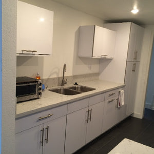 Image Title Nice, shiny, comfortable  and modern kitchen design by our company. We can design, fabricate and install your dreams kitchen.