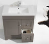 L750 BASIN+CABINET Greyish vanity with white top and nikel nobs.