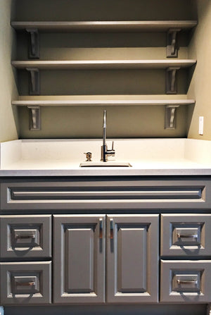Anaheim Gray (Kitchen Cabinet), vanity with metallic handles. 